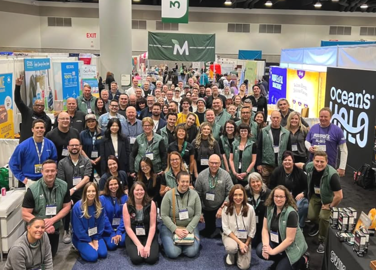 large group of the Marsham team smiling and posing for a group photo