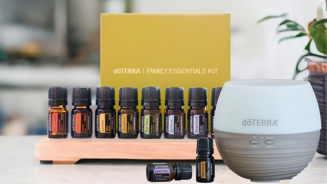 Family Essentials Kit doTERRA su vassoio di legno con Diffusore Petal e due boccette aggiuntive