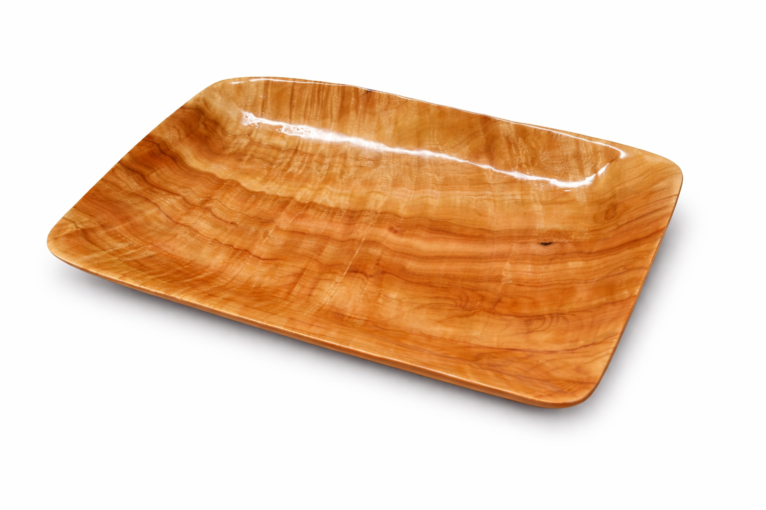 A rectangular wooden tray with a natural wood grain pattern and curved edges, placed on a white background.