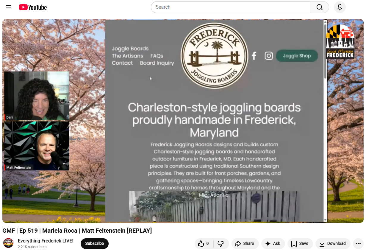 Screenshot of a YouTube video featuring a presentation about Frederick Joggling Boards, handmade in Frederick, Maryland, with a background of blooming cherry blossom trees and two presenters in inset video windows.