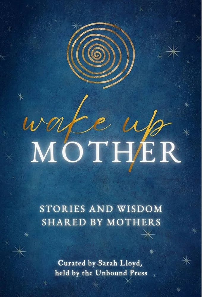 Book cover titled 'Wake Up Mother: Stories and Wisdom Shared by Mothers,' with a dark blue background, gold spiral design, and small star-like accents.