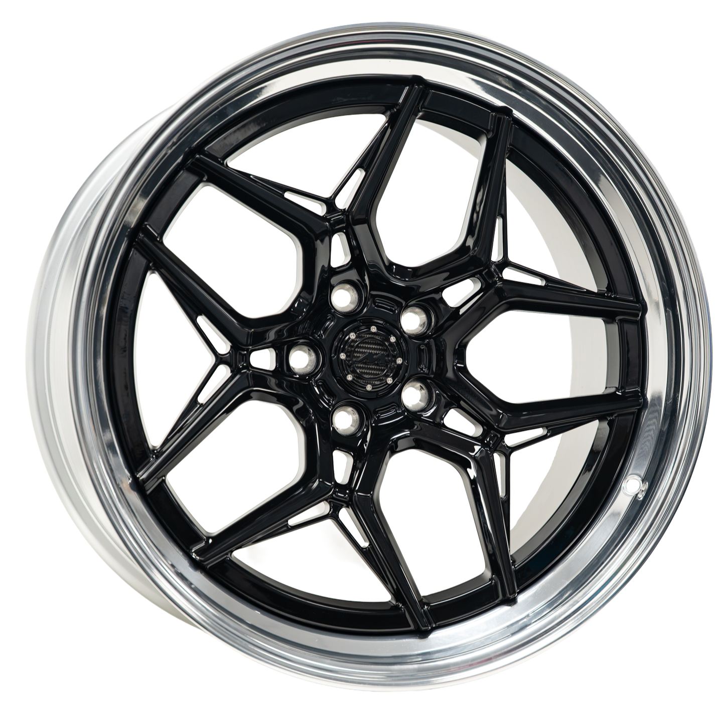A black alloy car wheel rim with a star-shaped spoke design, viewed from the front with a chrome outer edge.