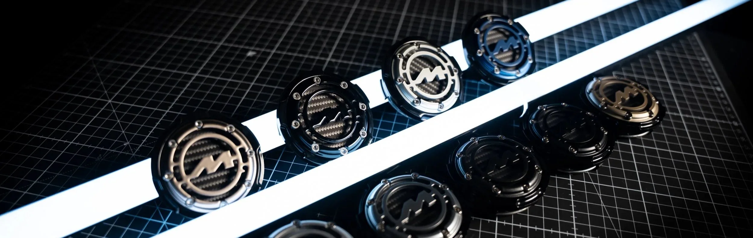 Multiple physical Bitcoin coins with a Lightning Network logo on a grid-lined surface, some coins are black, others are gold, with a bright white light reflecting off one side.