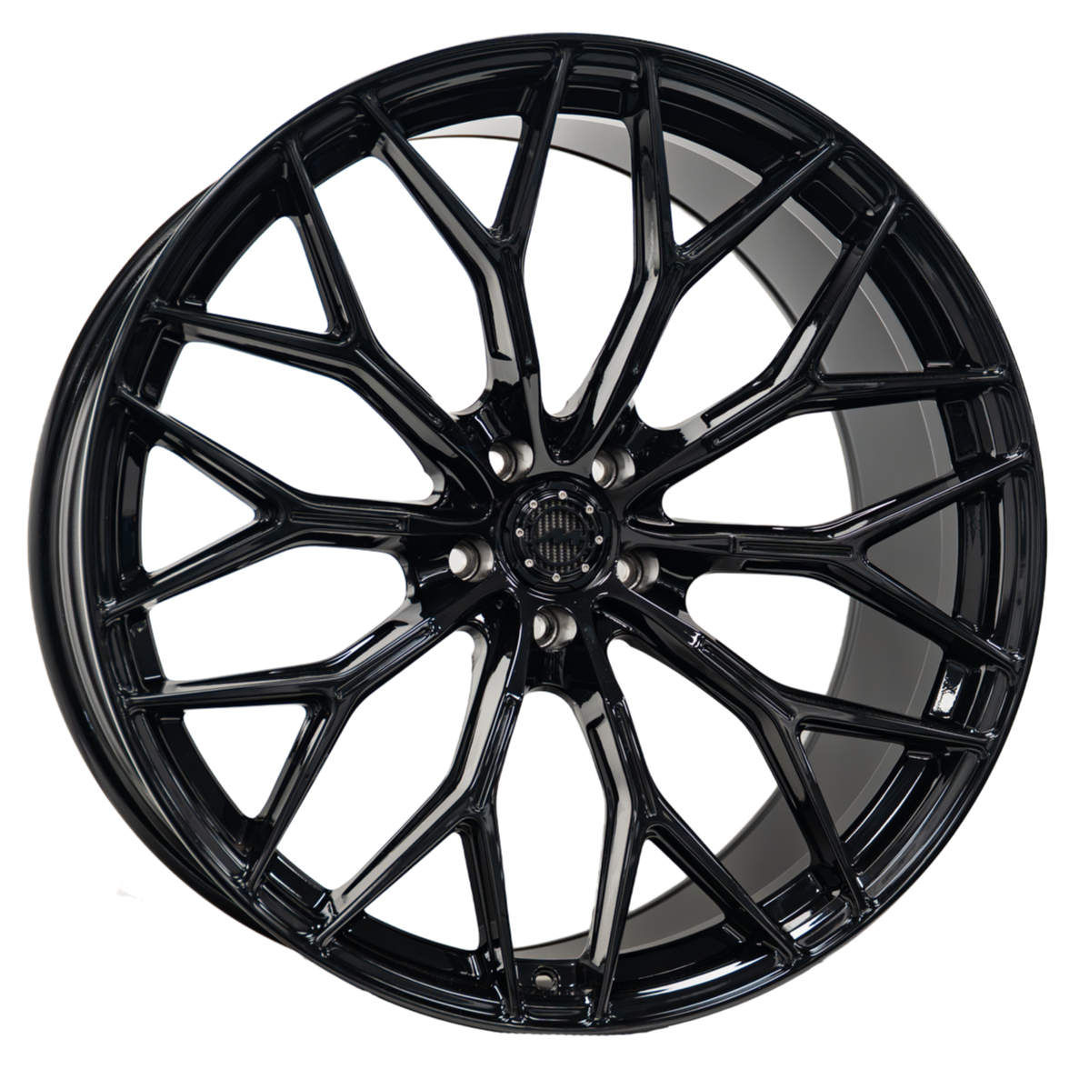 Black alloy car wheel with a multi-spoke design.