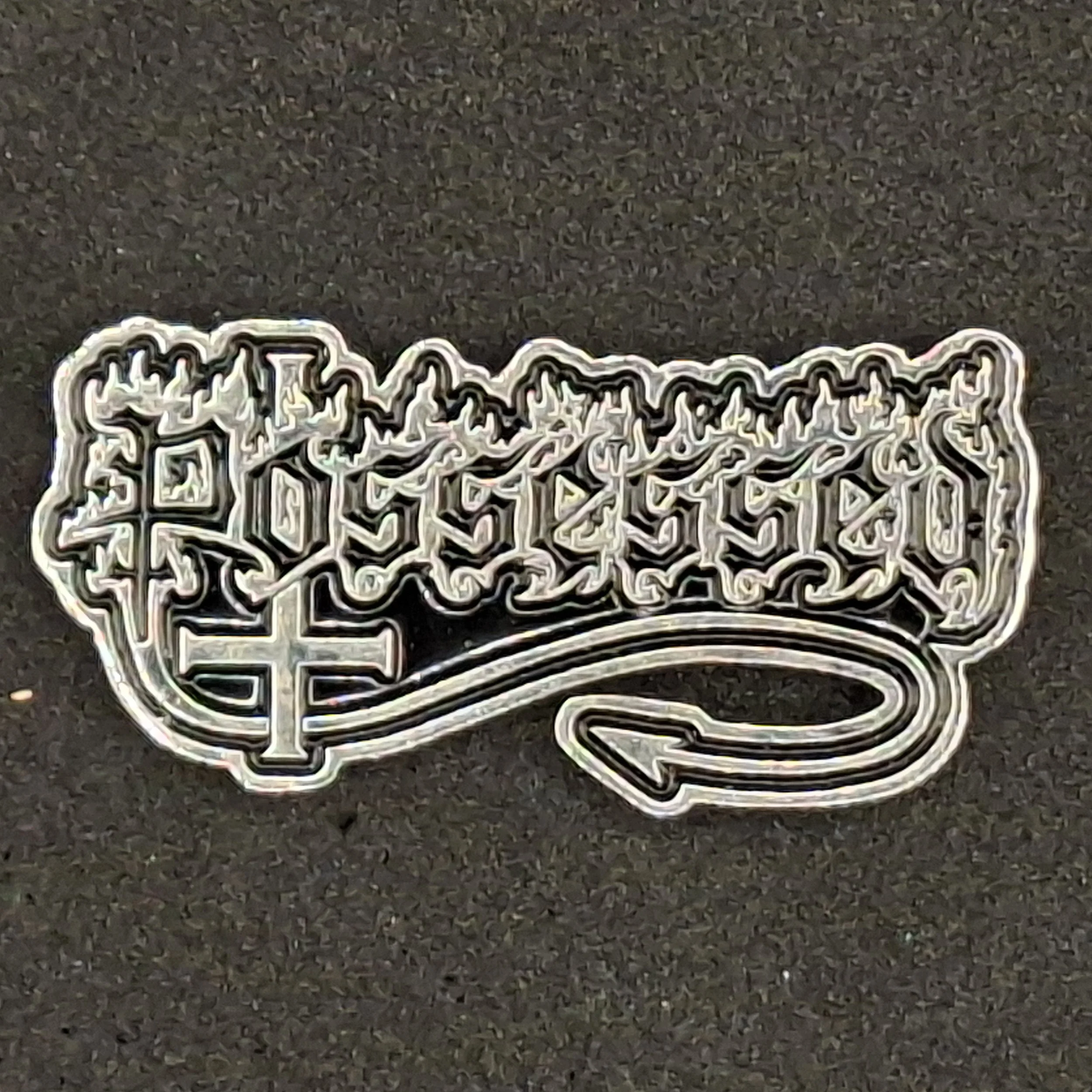 Possessed logo pin