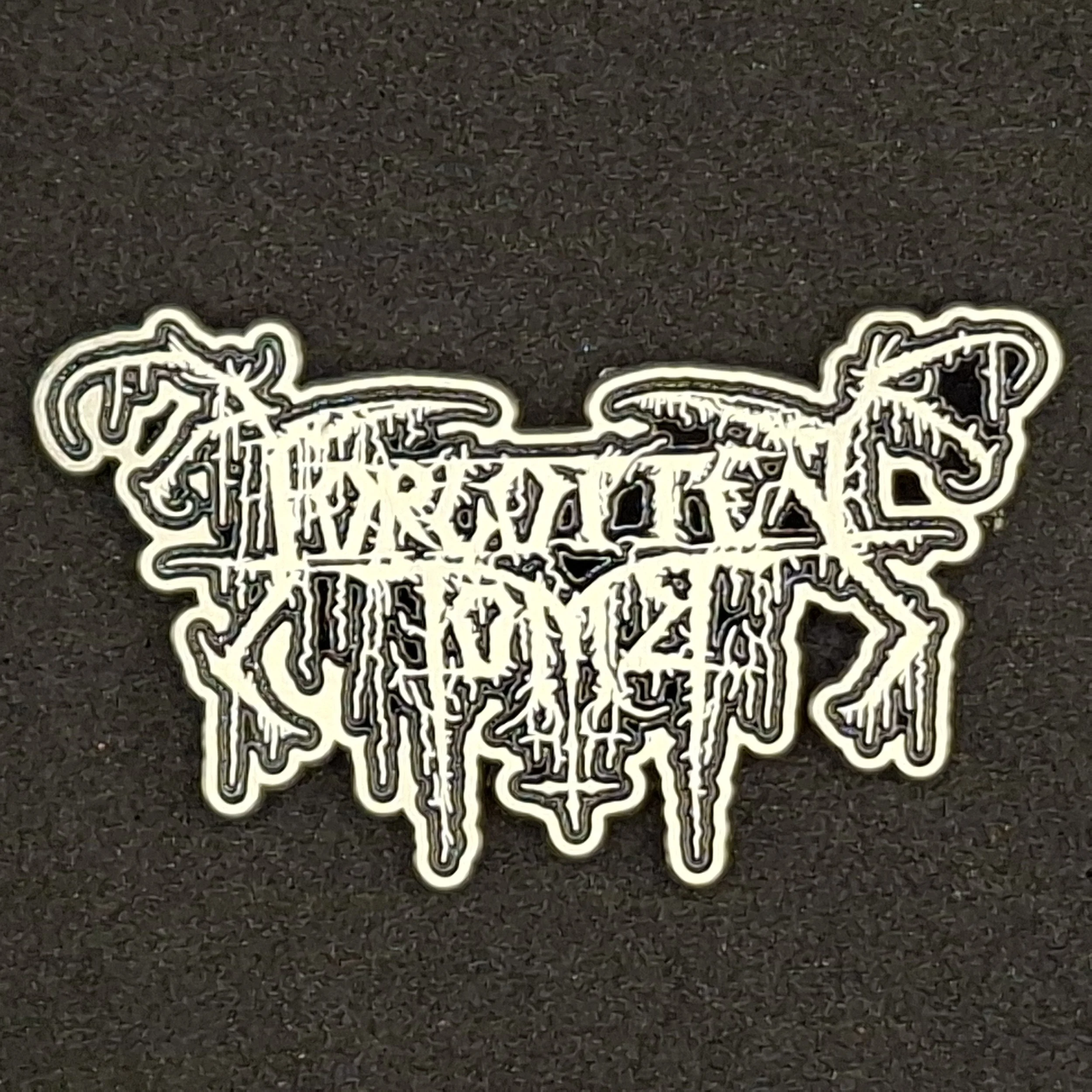 Forgotten Tomb logo pin