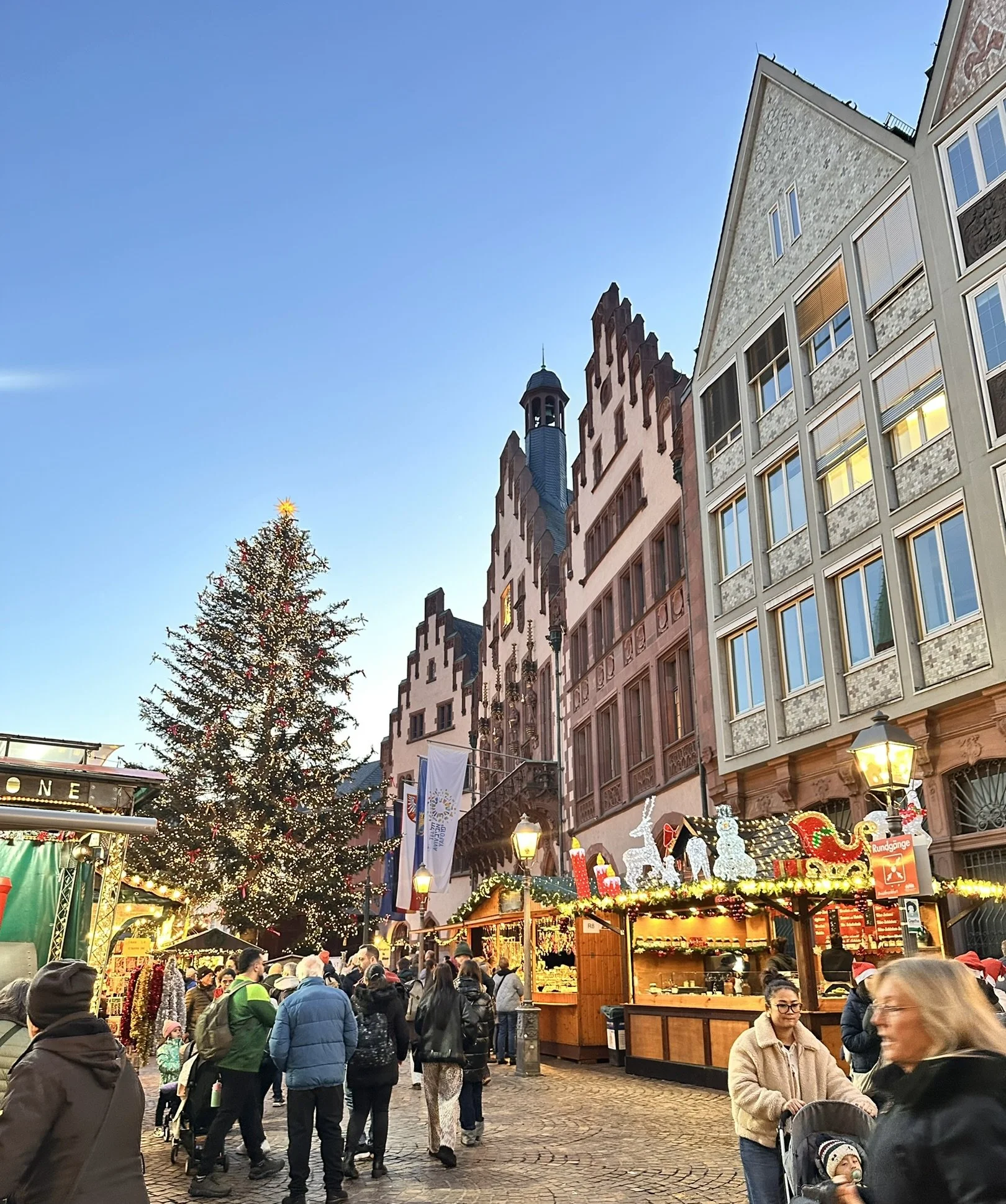  Traditional German Christmas pyramid at Frankfurt Römerberg Christmas market at dusk