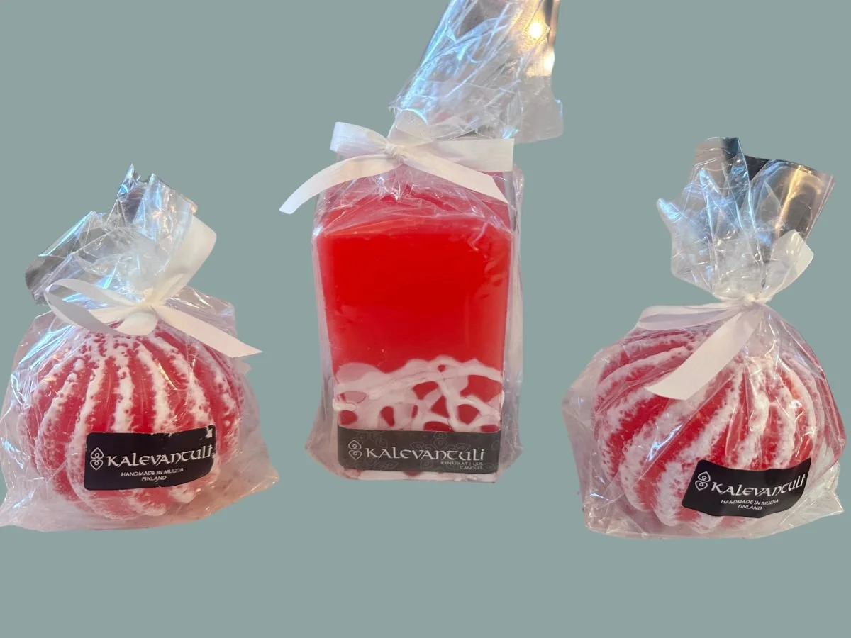 handmade red and white Christmas candles.jpg