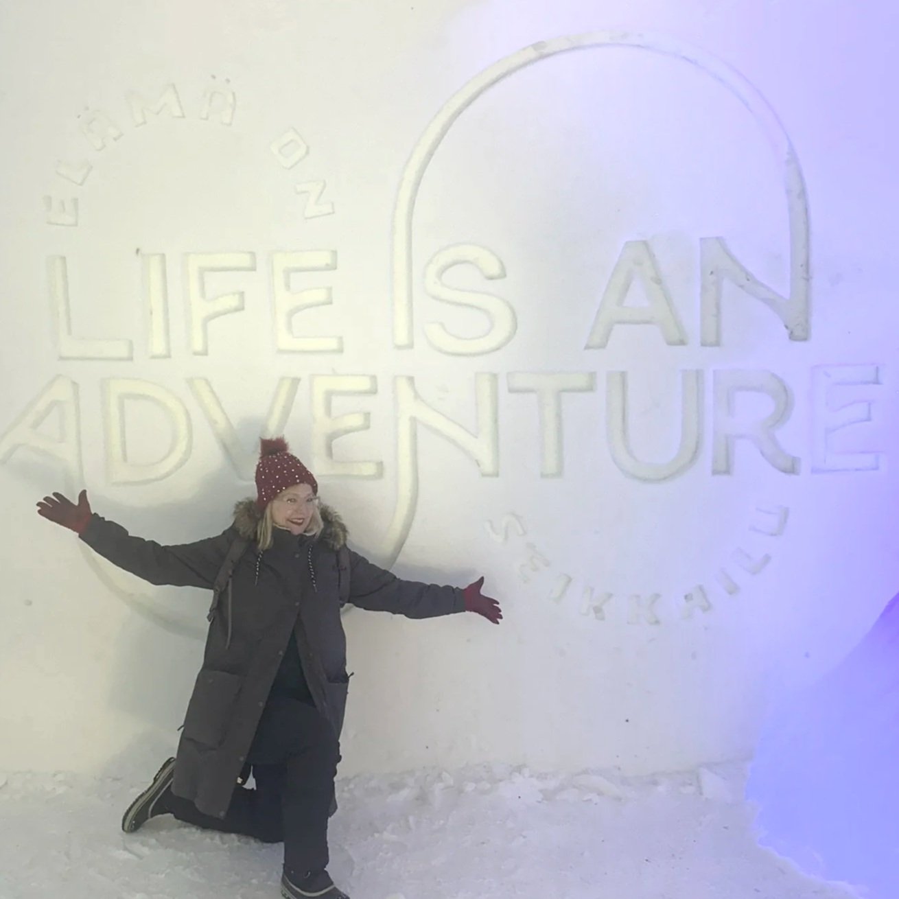 Darlene Bass at Arctic SnowHotel ice building Finland