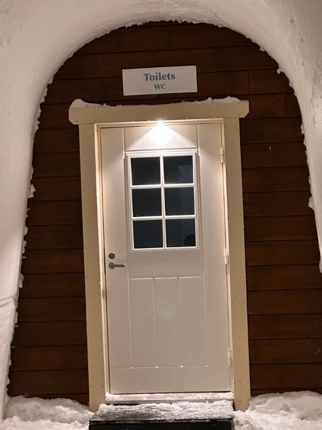 Bathroom entrance attached to Arctic SnowHotel in Rovaniemi, Finland - separate from ice hotel sleeping rooms