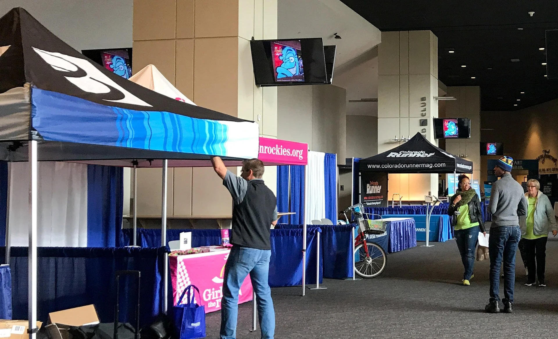 Event setup at Broncos Stadium for Colfax Marathon Expo