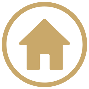 Ein goldener Kreis mit einem Haus-Symbol in der Mitte, die Farbe des Hauses ist ebenfalls gold, symbolisiert den Standort.