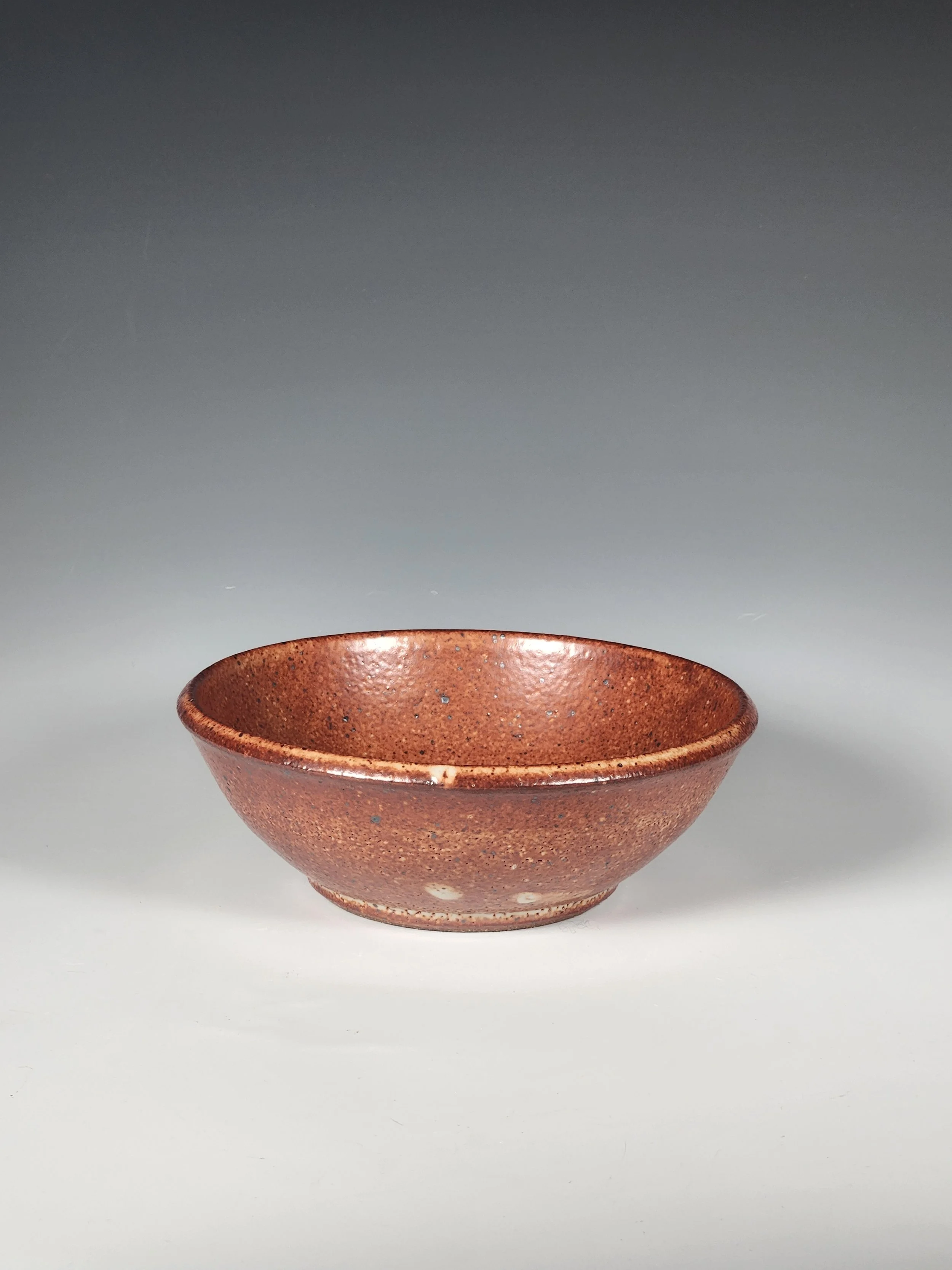 "Handcrafted Stoneware Bowl with Earthy Shino Glaze" 2.5 inches tall
