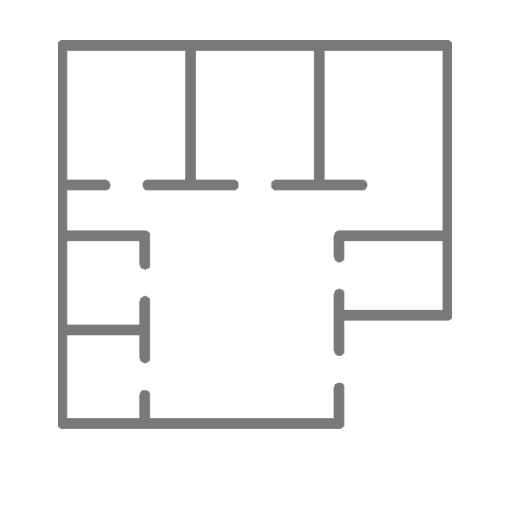 Floor plan of a building with multiple rooms and hallways.