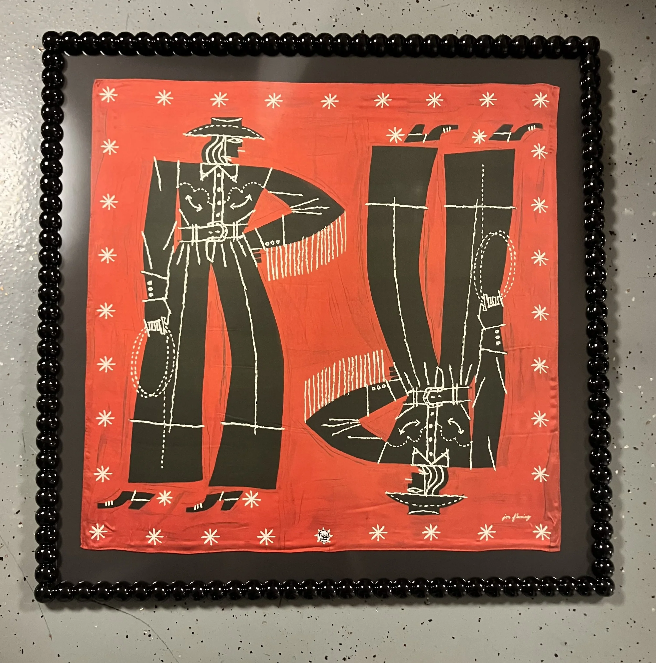 Fabric art floated in frame