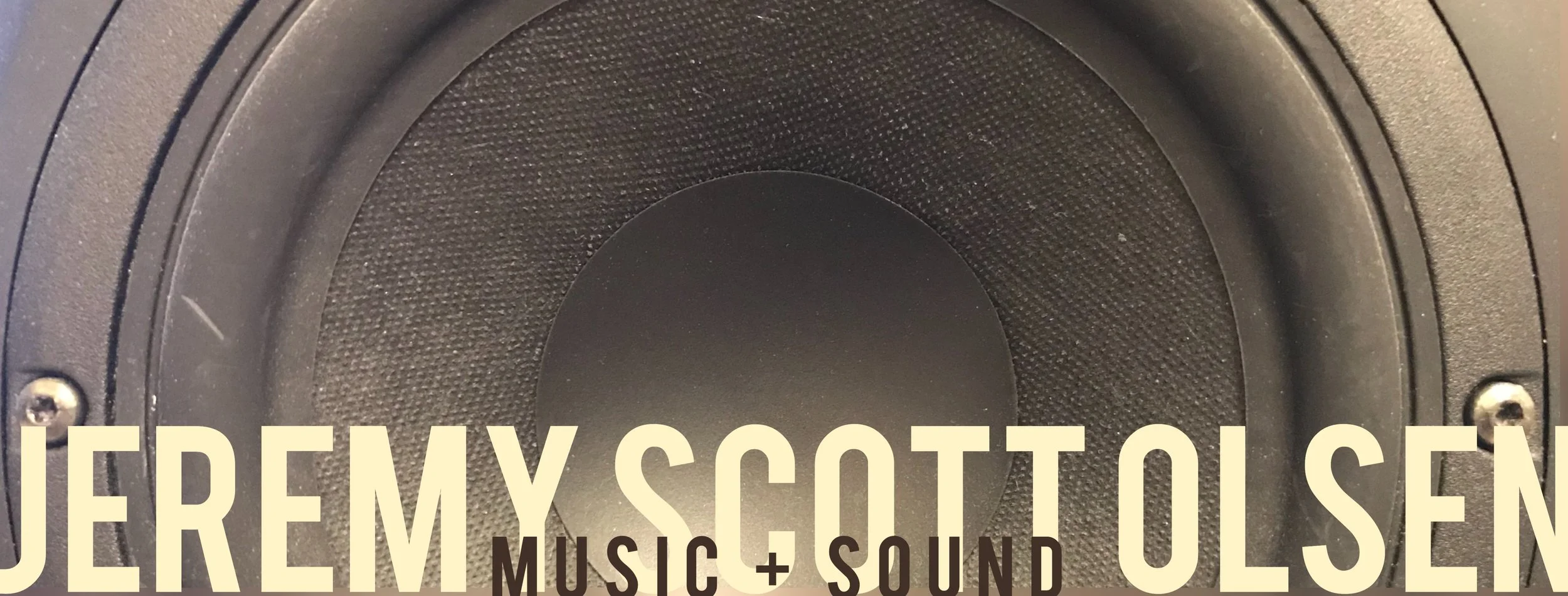 a close shot of a speaker cone, overlaid with the name Jeremy Scott Olsen and the words Music and Sound