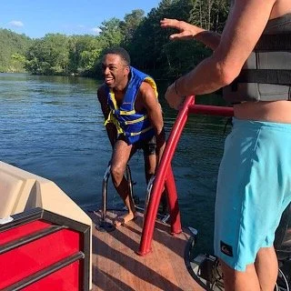 Tj Fields smiling and spreading kindness.