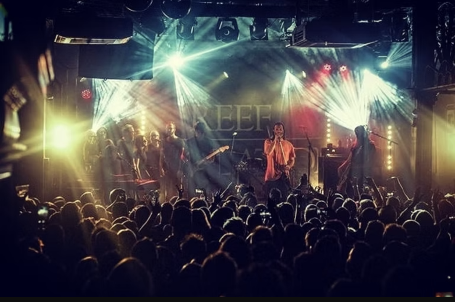 Crowd-view of Soul of the City Choir performing live with Reef.