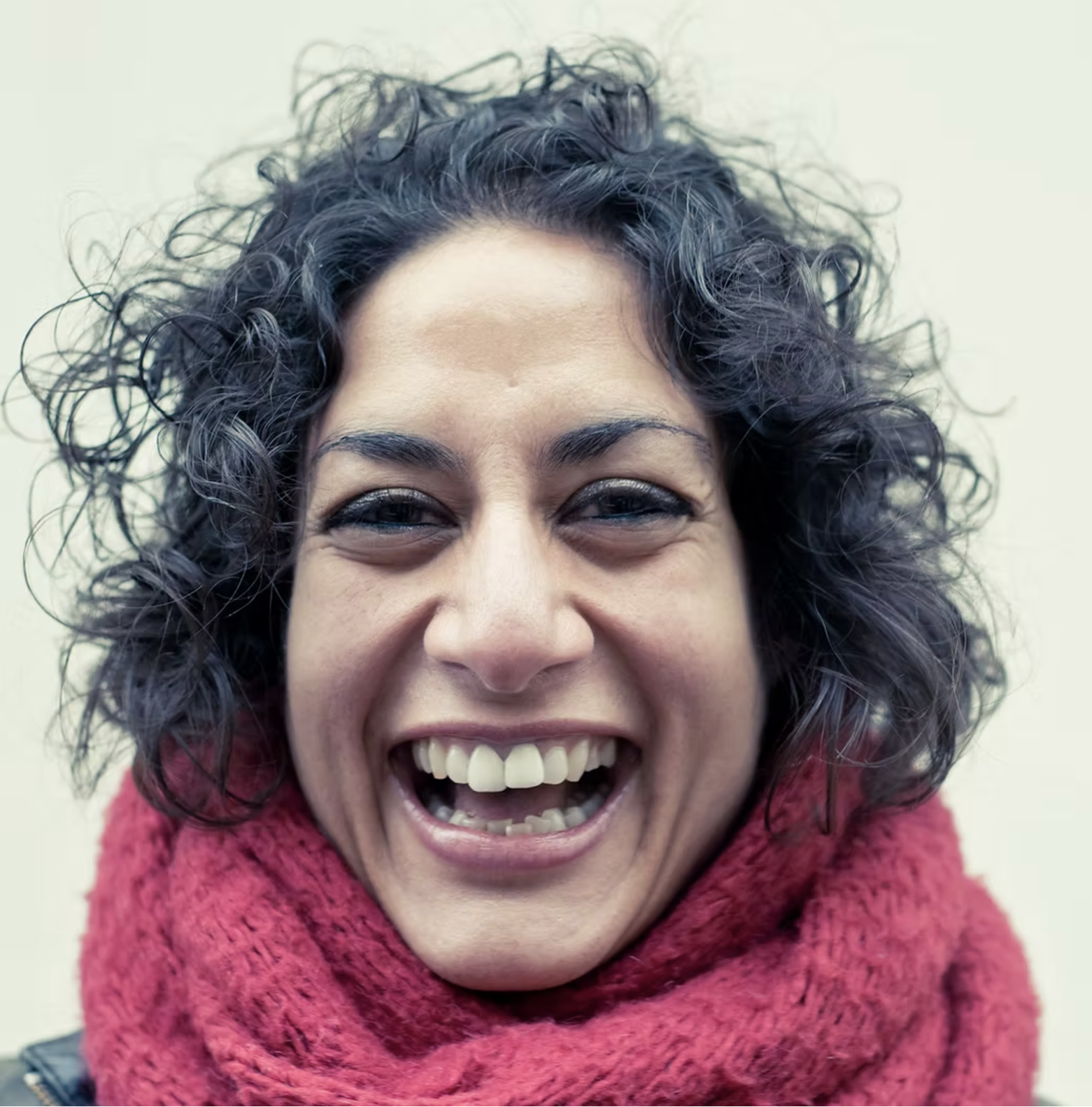 Vanessa, founder and leader of Soul of the City Choir, smiling at the camera.