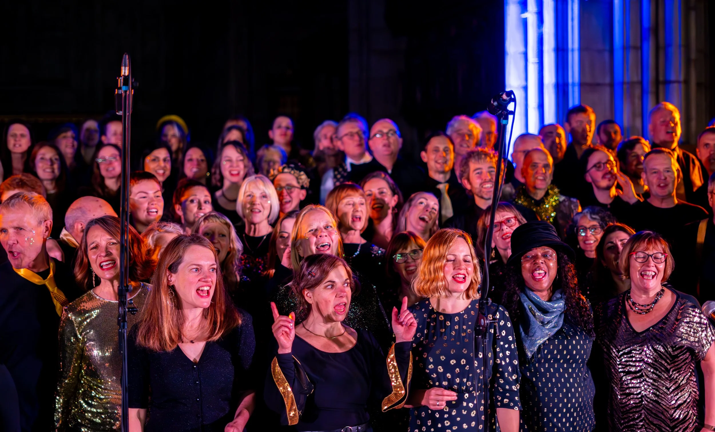 Group of Soul of the City Choir singers performing on stage.