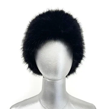 Mannequin head wearing a black ushanka hat with fur trim