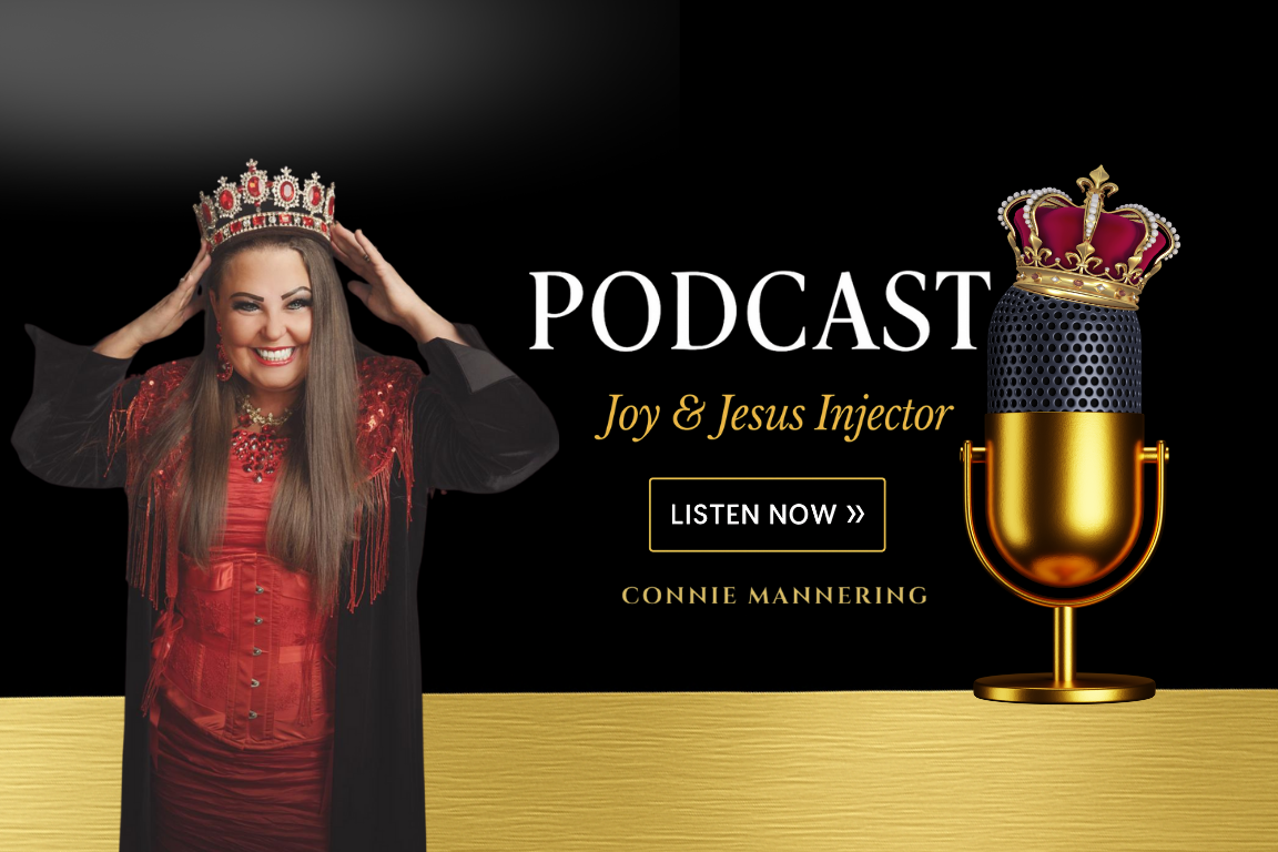 A woman with long brown hair wearing a crown, red top, and black blazer, smiling and holding her crown, next to a large golden and black microphone with a crown on top of it, promoting a podcast titled "Joy & Jesus Injector" by Connie Mannering.