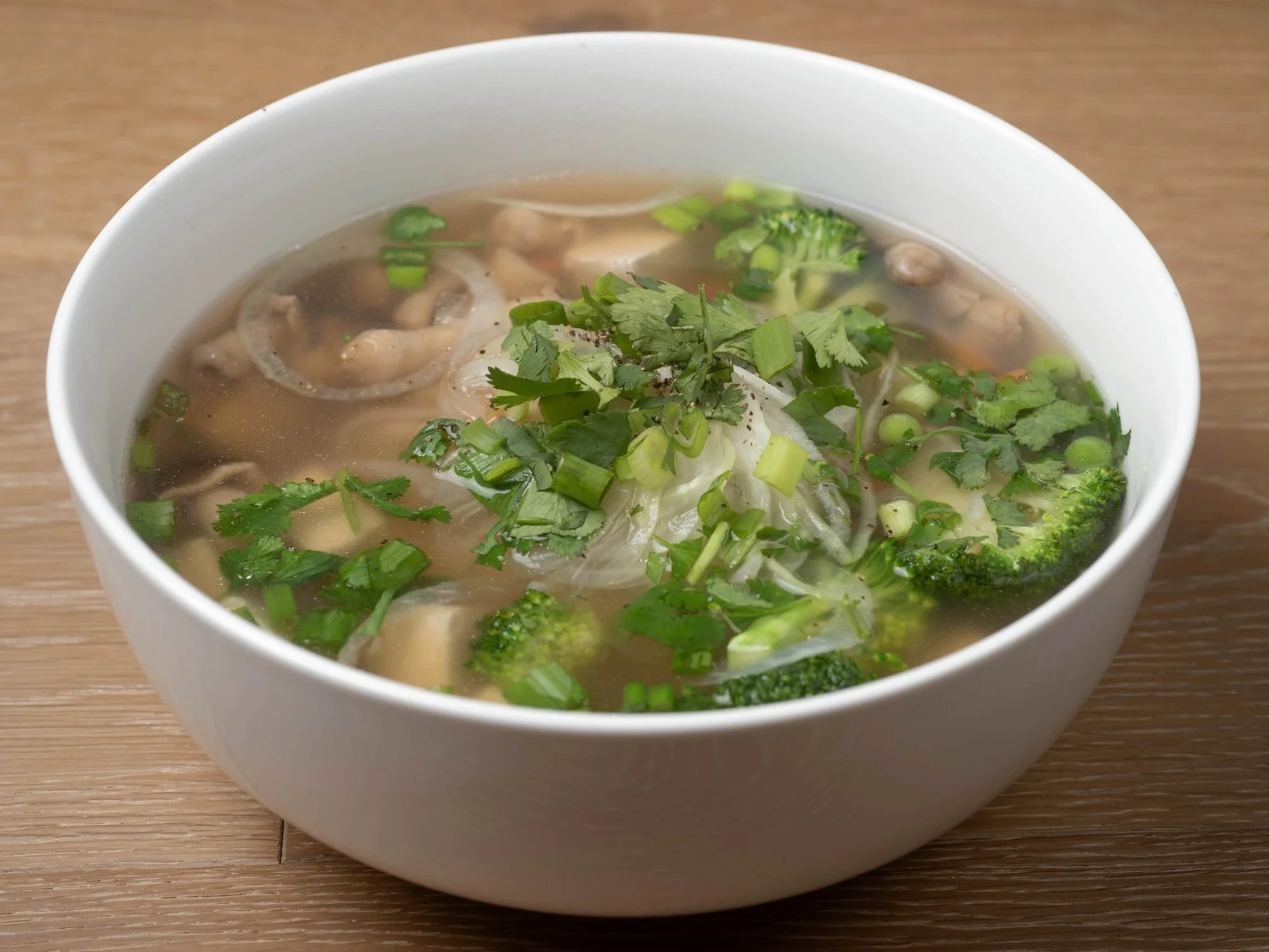 Bowl of vegan phở (phở chay) with tofu, broccoli and mushrooms at Noble Phở in Round Rock, TX