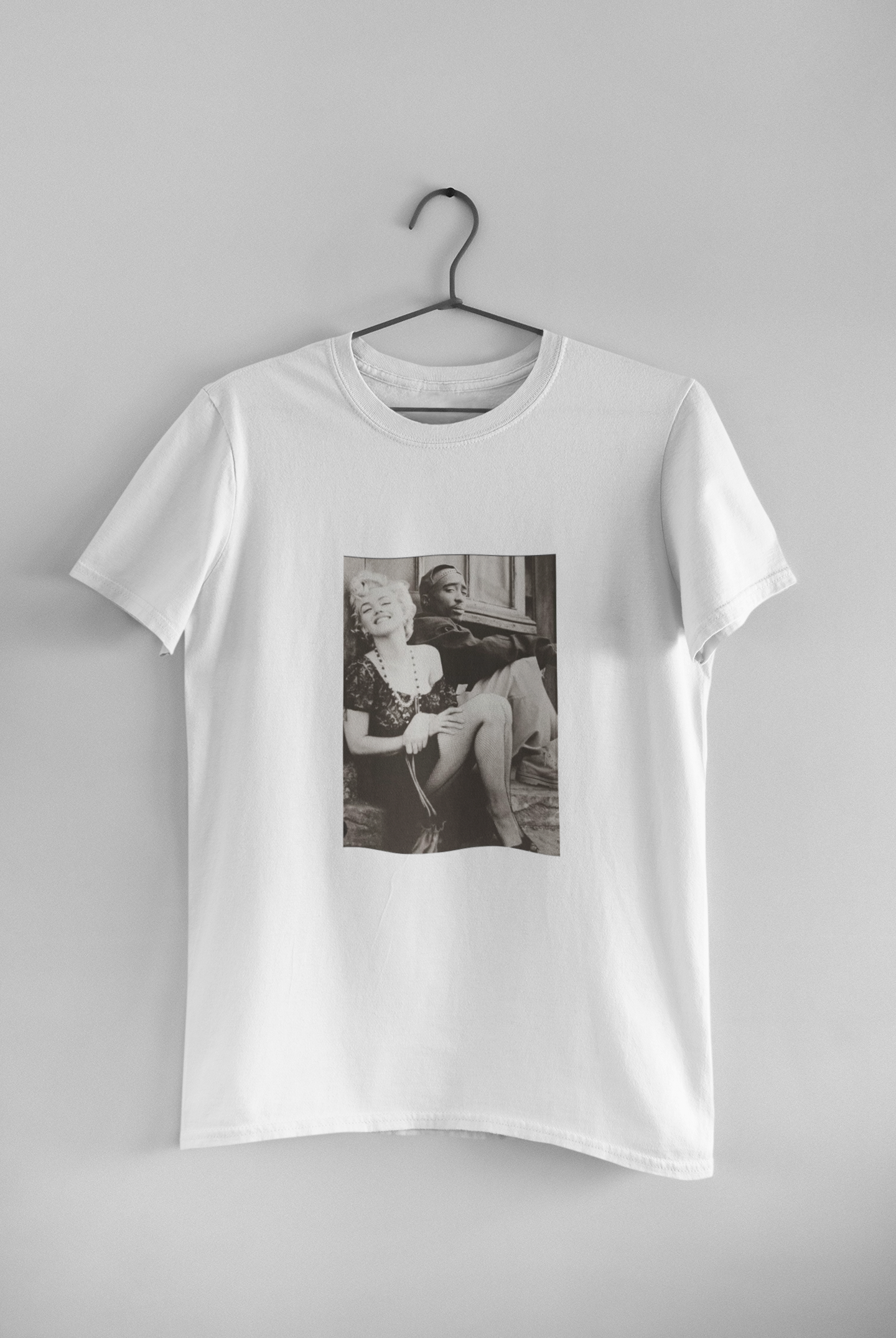 mockup-of-a-basic-round-neck-tee-hanging-on-a-wall-33734 (2).png