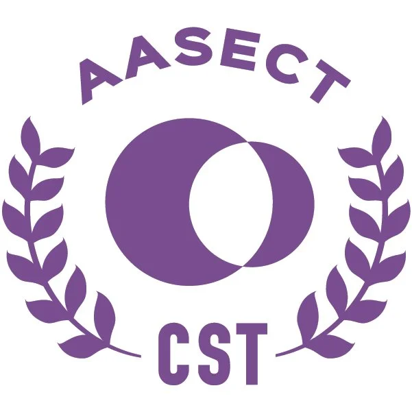 A purple logo with the words 'AASECT' at the top and 'CST' at the bottom. In the center, there are two overlapping circles, and the logo is surrounded by a laurel wreath on each side.