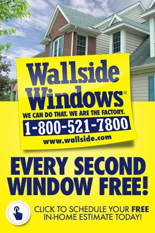 A yellow and blue sign in front of a house advertising Wallside Windows, with a primary message that every second window is free, and a call to action to schedule an in-home estimate.
