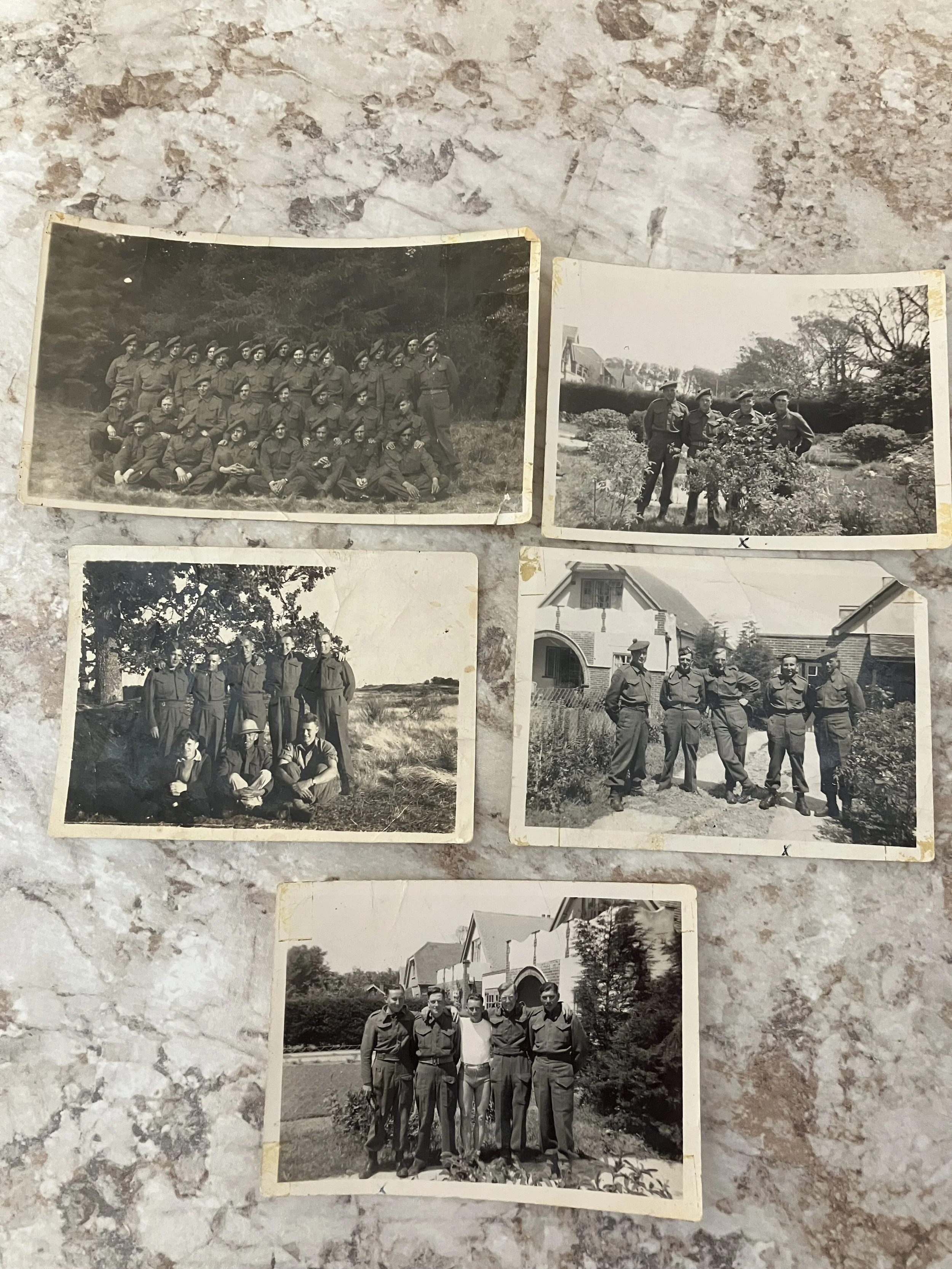 A series of black and white photographs of groups of young men in military uniforms, taken outdoors in different settings, possibly during the mid-20th century.