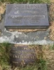 Two adjacent grave markers with inscriptions, one for G. A. T. Thurn who lived from 1924 to 1944, and another for Alfred Glasson Smethurst, with dates 1900 to 1990.