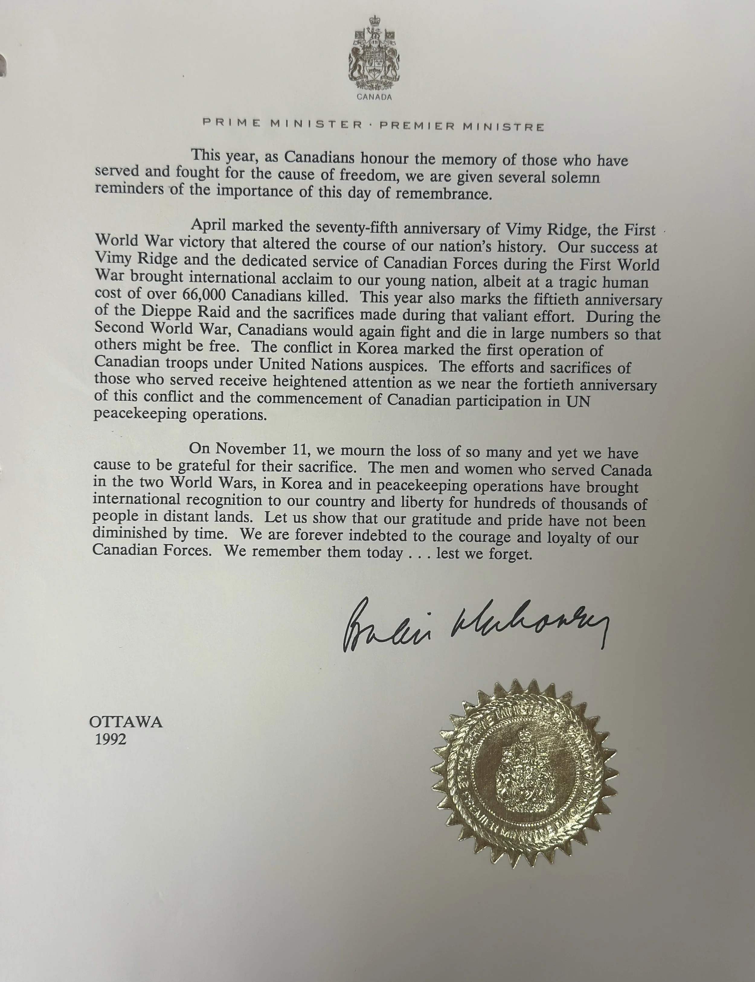 Official letter from the Prime Minister of Canada, dated 1992, with a gold seal at the bottom right and a signature at the bottom center, commemorating Remembrance Day.