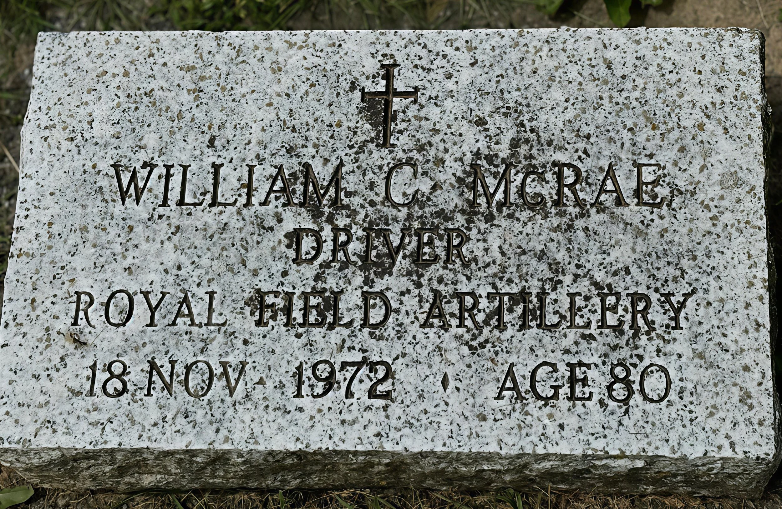 Gravestone with a cross and engraved text honoring William C. McRae, a driver with Royal Field Artillery, died November 18, 1972, at age 80.