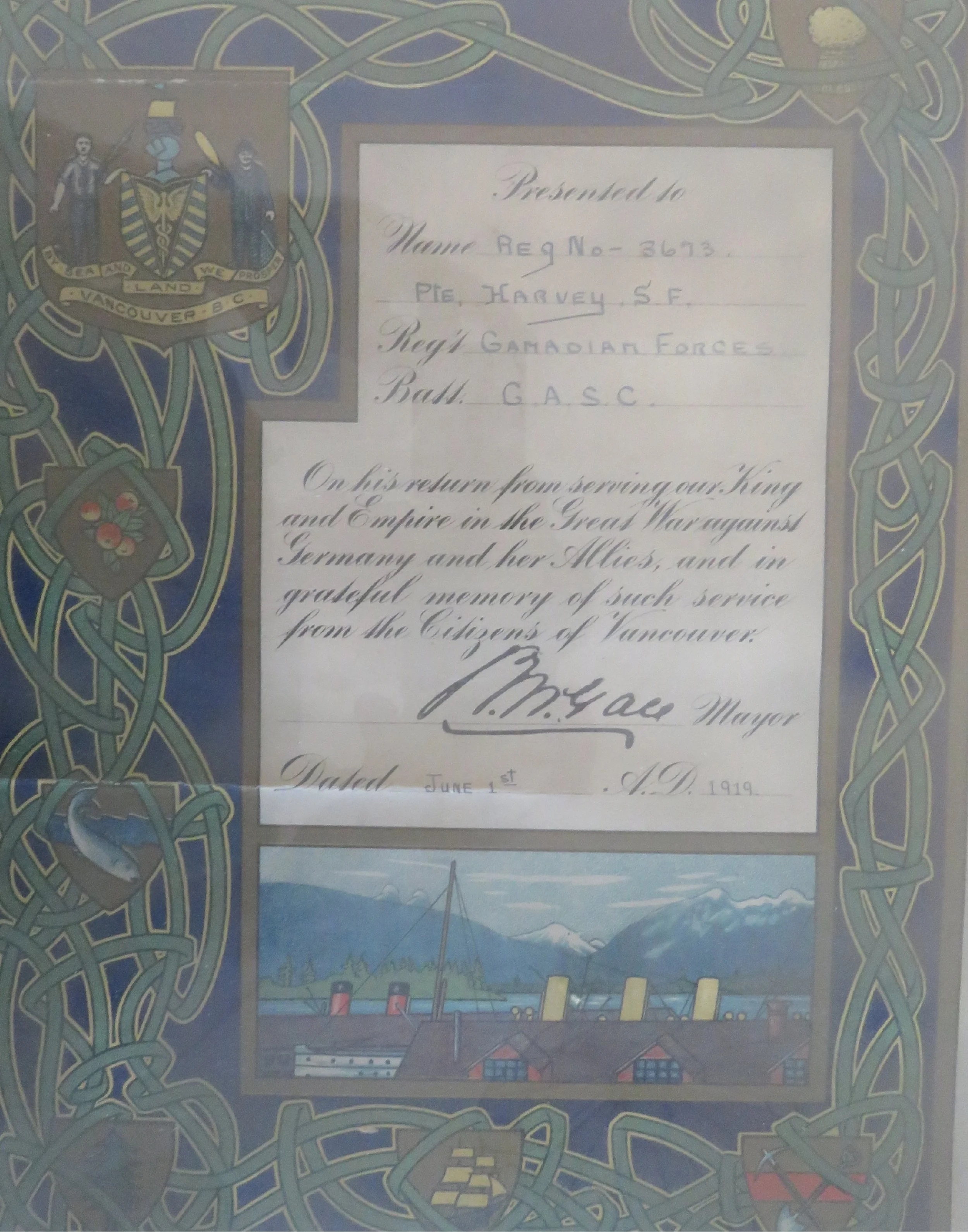 A framed historical document with decorative border, featuring the Vancouver, B.C. coat of arms and a scenic illustration of a harbor and mountains.