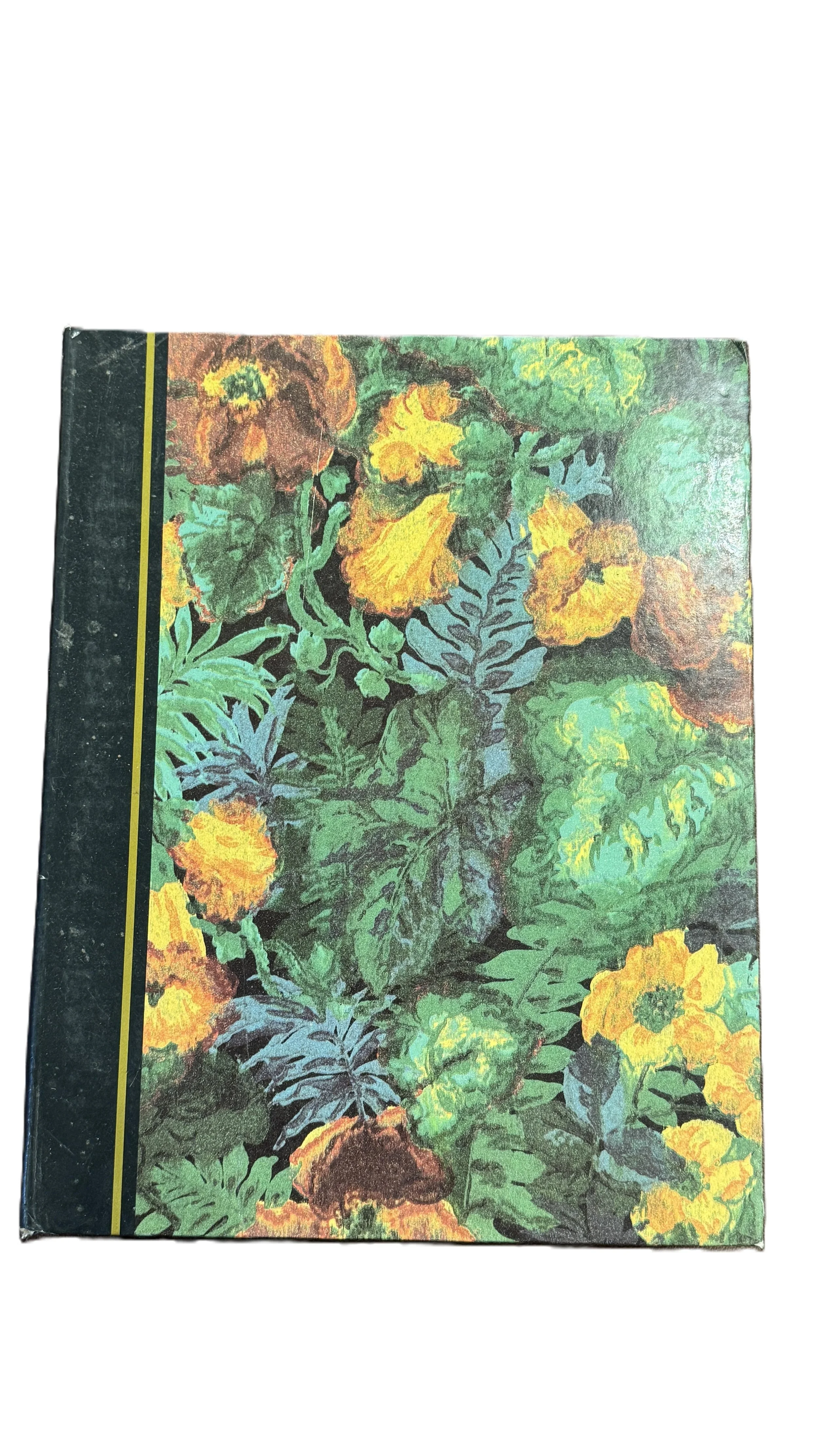 A book cover with a floral design featuring green leaves and yellow flowers.