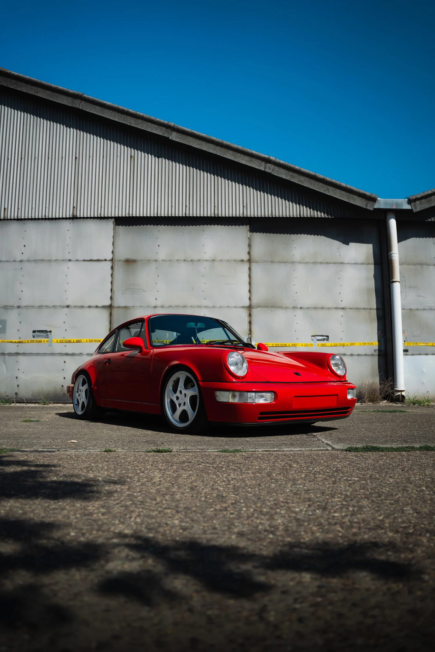 Porsche 964 op locatie, automotive fotografie, fotograaf Puurs, yelu visuals