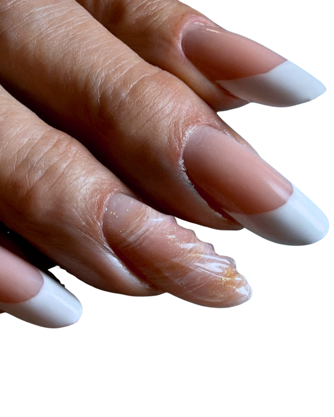 Close-up of a person's hand with well-manicured nails with French tips.