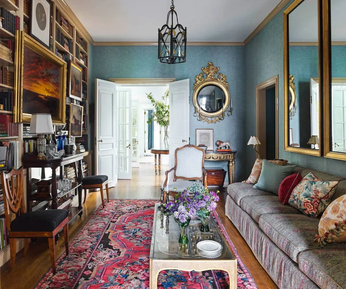 Astor-Courts-Lounge-with-full-wall-bookshelf-and-seating.jpg