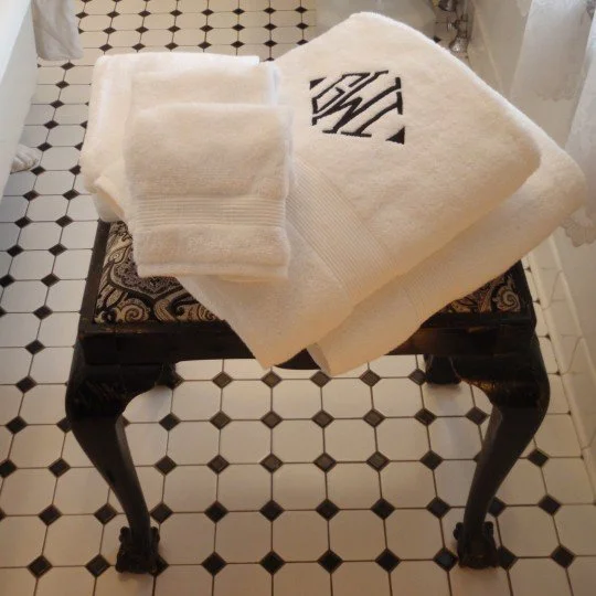 Large fluffy towels in a luxurious guest bath