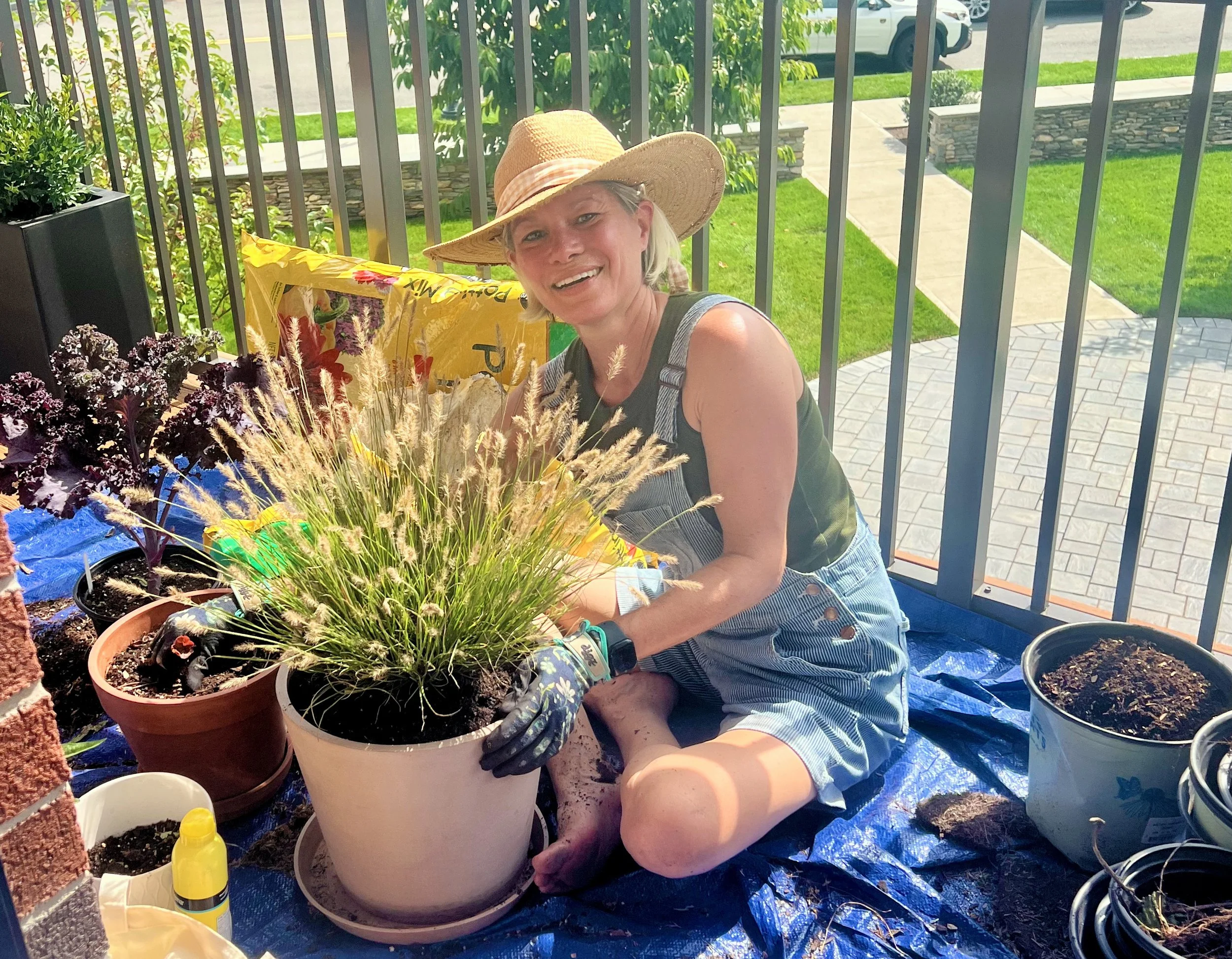 gardener planting on balcony