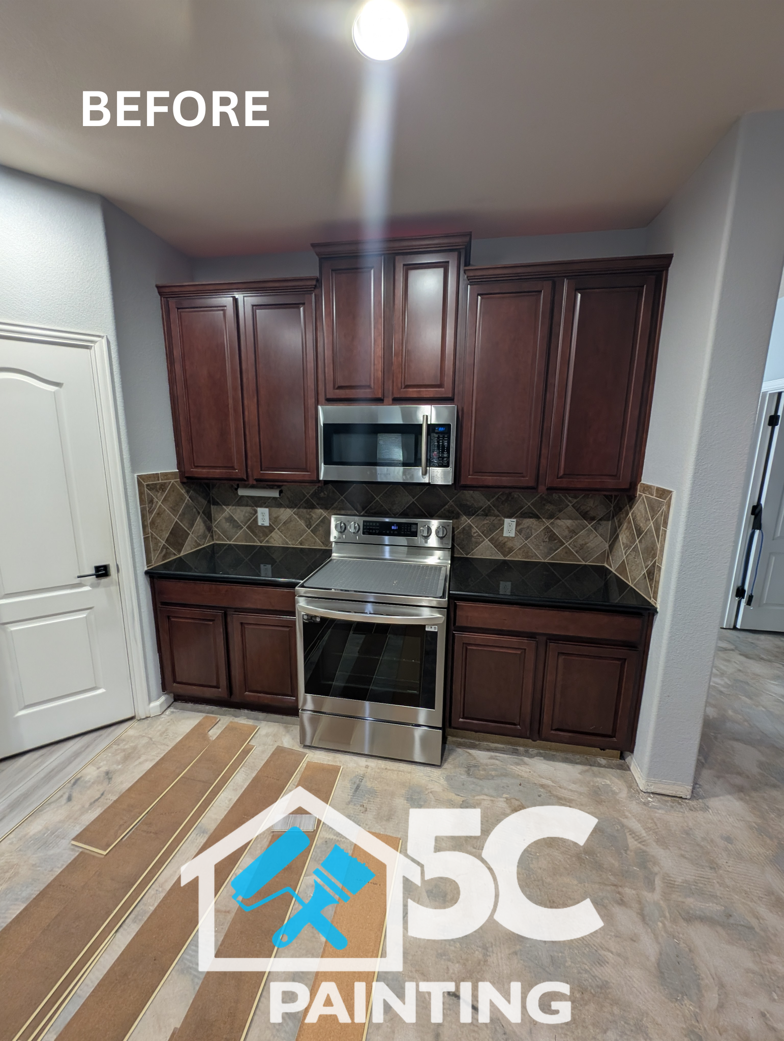 Before: original cherry wood cabinets in this Lake Dallas kitchen, ready for a full repaint. Outdated wood tones like this are one of the most common reasons homeowners call for cabinet painting.