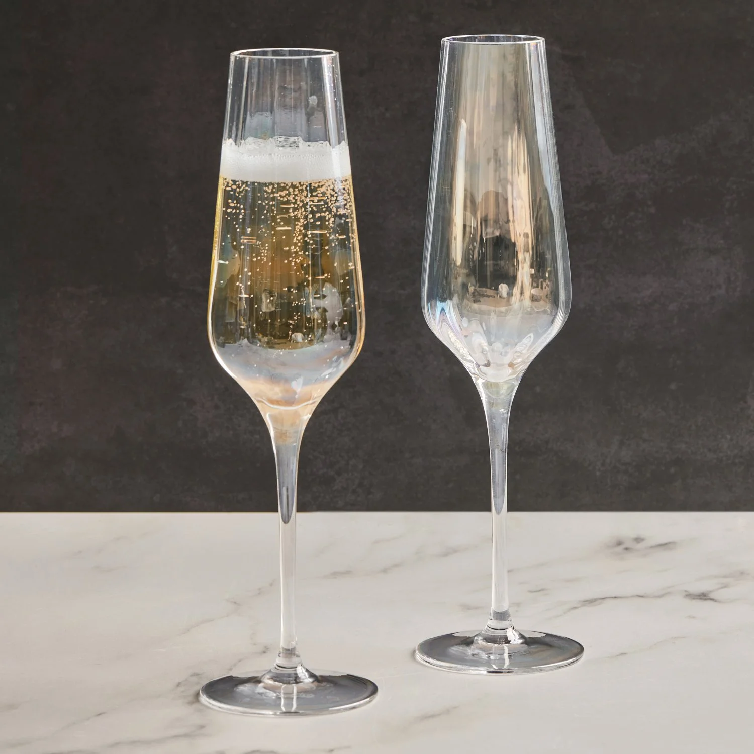 ASD10298 - Set of 2 Palazzo Champagne Flutes - lifestyle with liquid.jpg