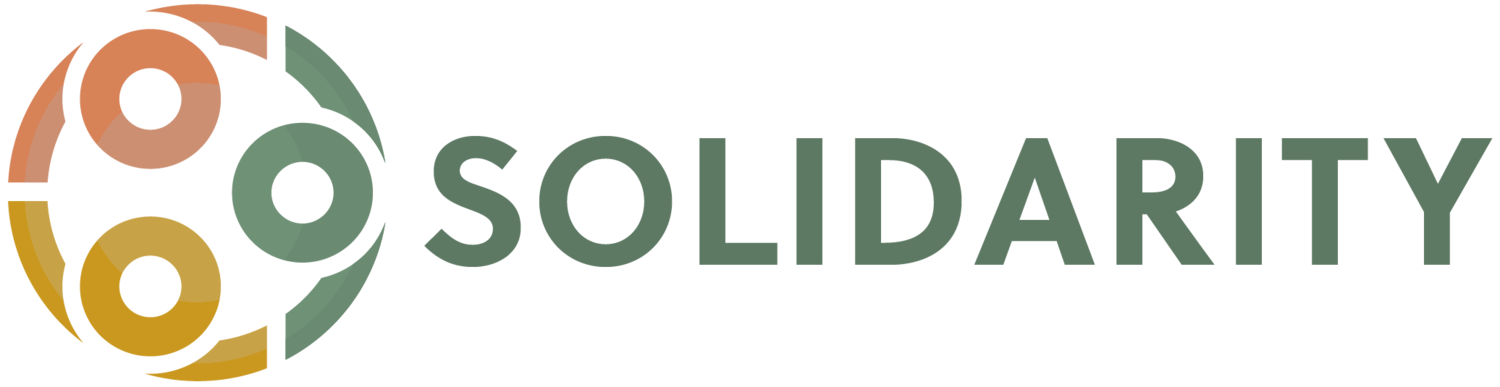 A banner with a colorful wheel graphic and blurred text in a green box.