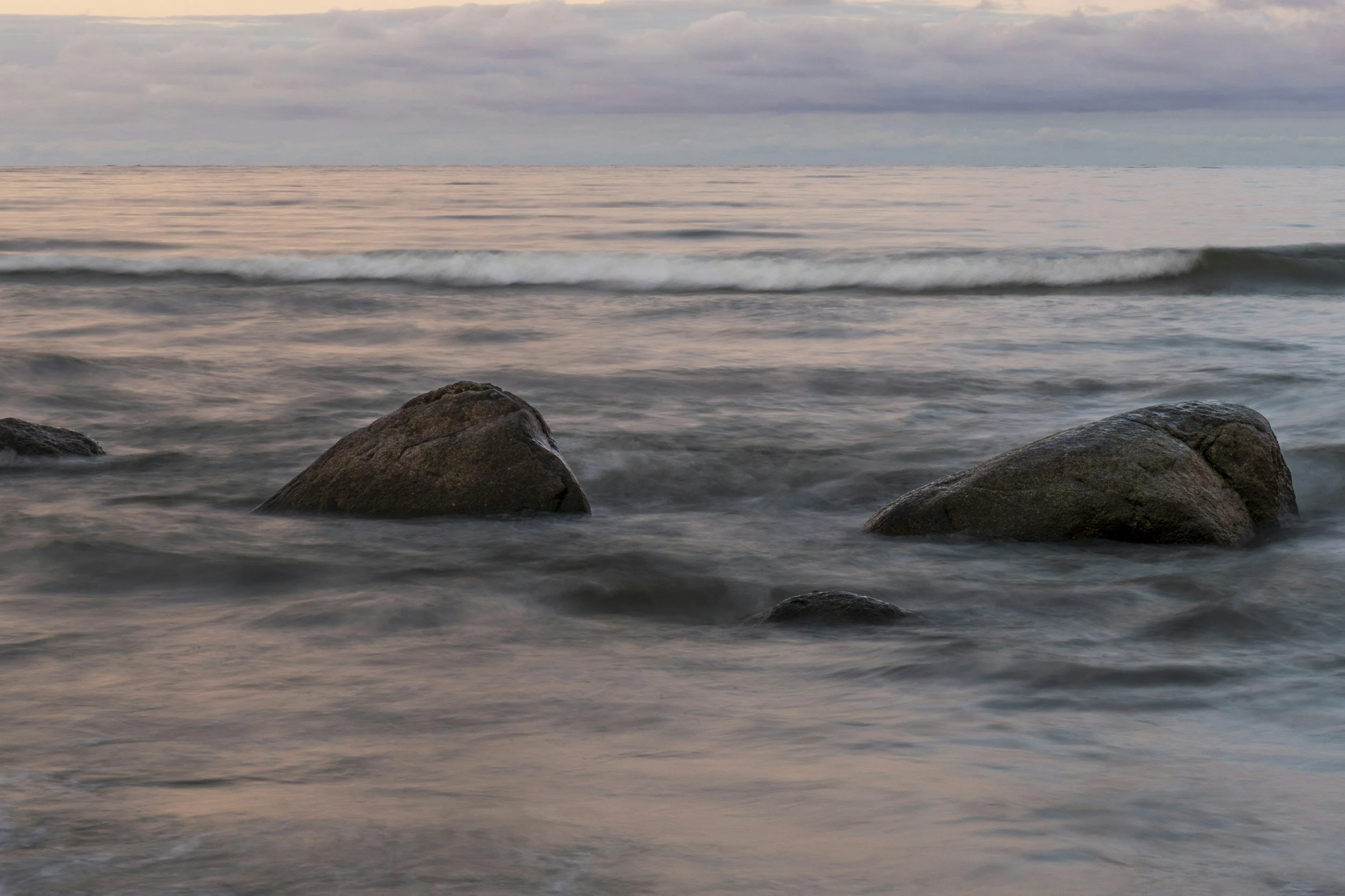 Couples/Families: Couple strong rocks under clear water, closely packed together.