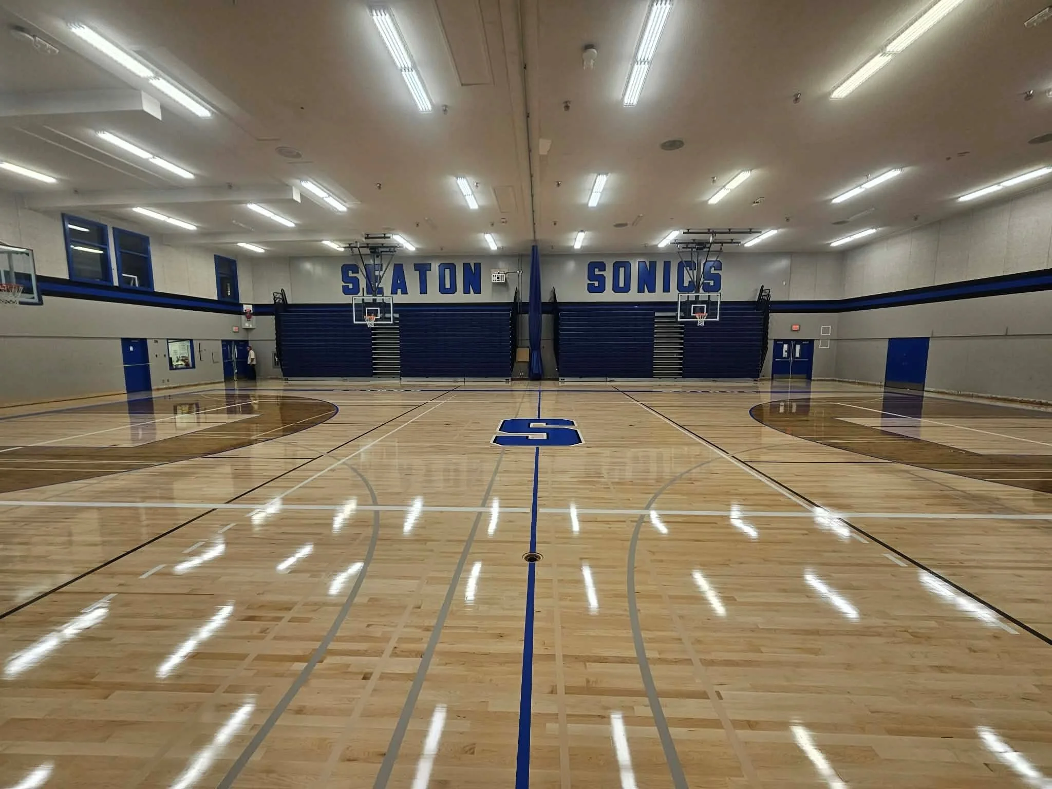 School Gym Knights Floor resanding.jpg