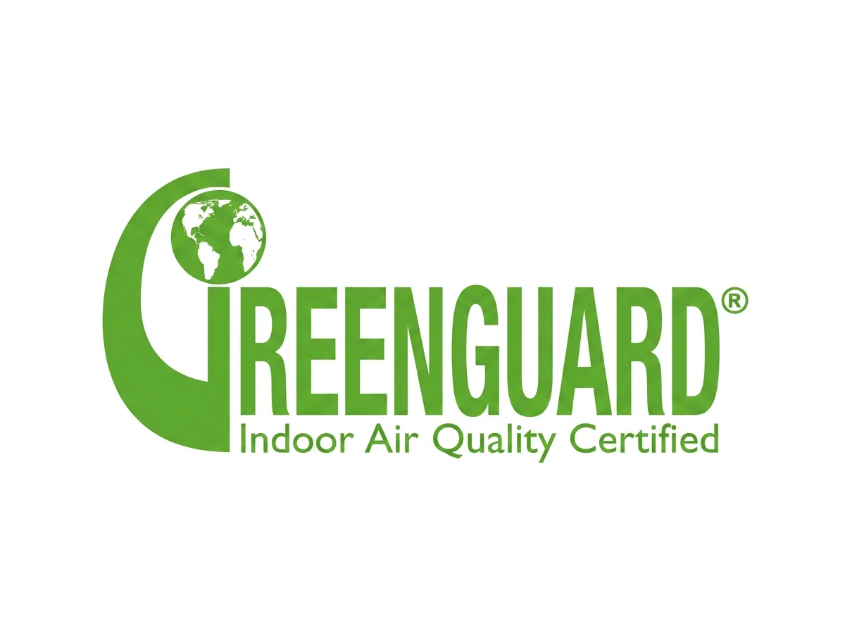 Logo for GreenGuard indicating indoor air quality certification, featuring a stylized green Earth and the text 'GREENGUARD Indoor Air Quality Certified'.