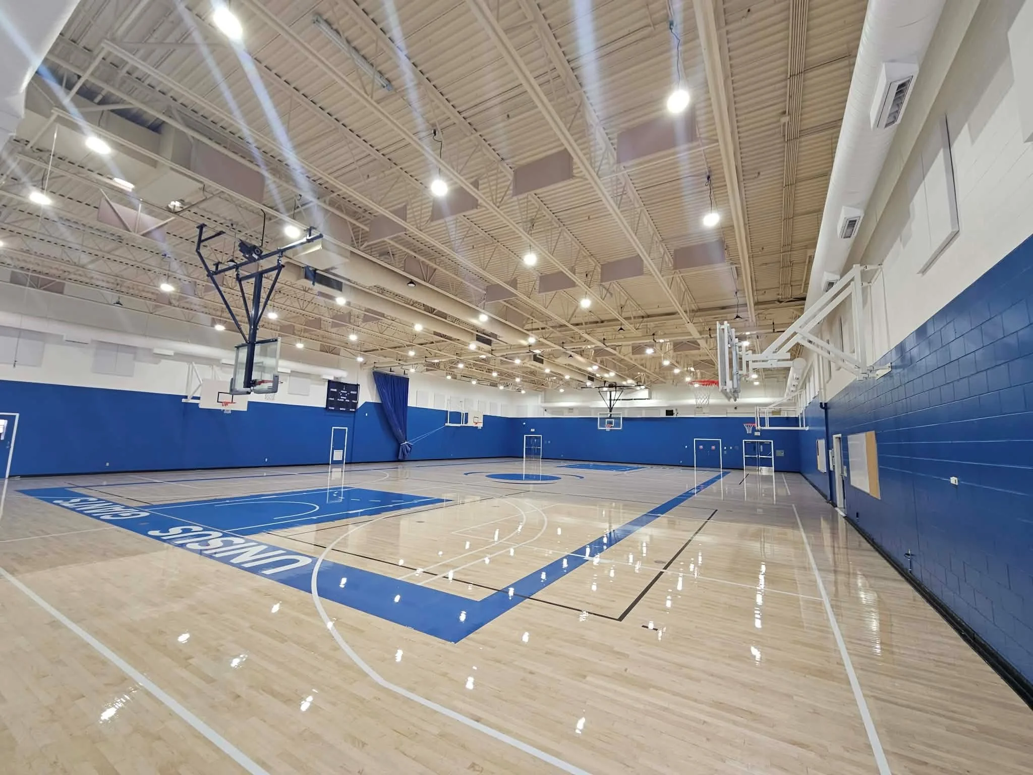 School Gym Knights Floor resanding 2.jpg