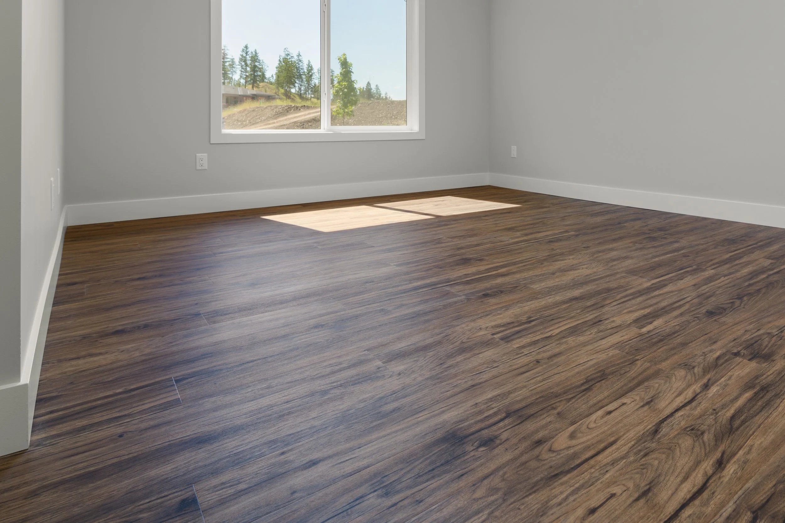 4 Vinyl Plank floor basement living room Kelowna R.jpg