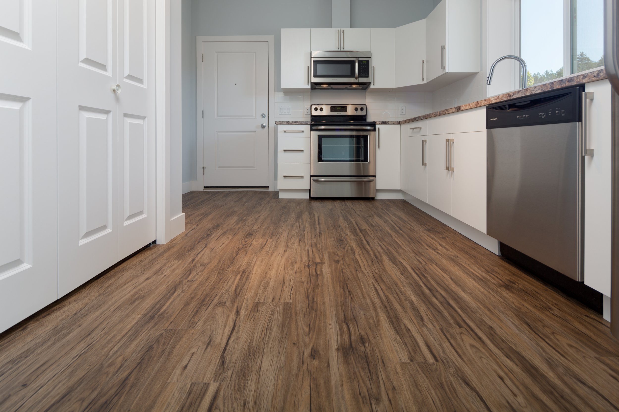 Laminate floor basement kitchen.jpg